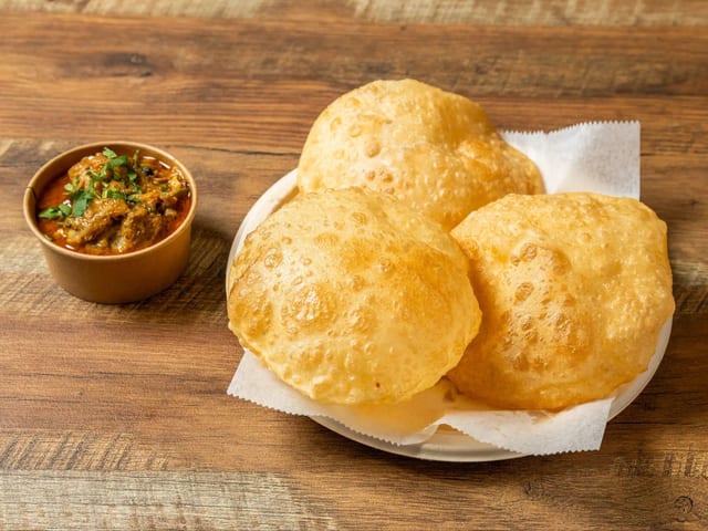 Poori With Chicken Curry.